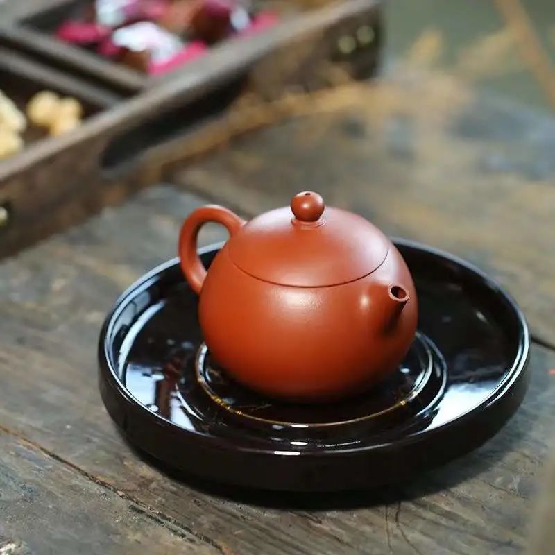 What are the most popular Yixing clay teapot shapes among women? What teas pair best with them?-1